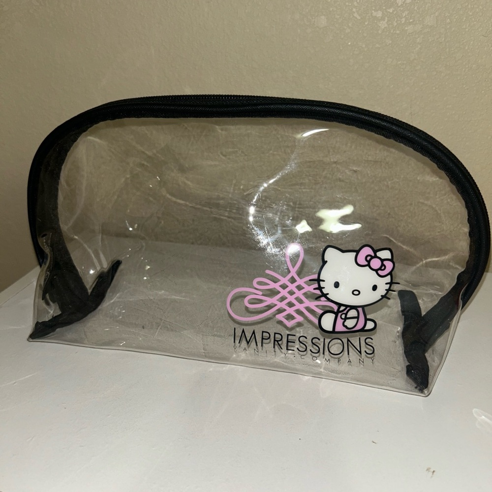 🎀🧸Impressions Hello Kitty Clear Pink Accent Cosmetic Bag🧸🎀